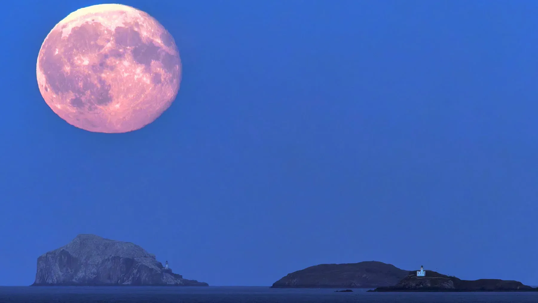 Moonrise above islands in the Firth of Forth